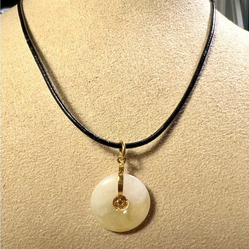 Round Jadeite Jade Pendant Necklace with gold tone bail, with 17” long leather.